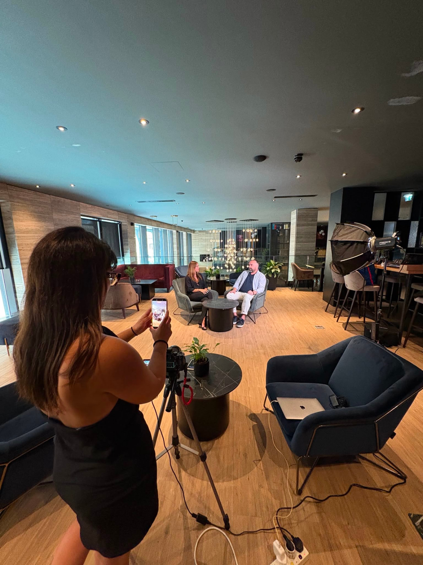 Behind the scenes of a shoot — Asia filming an interview